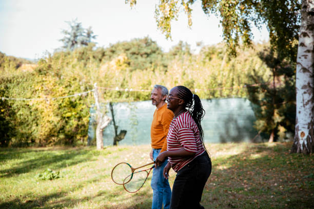 together we are a team that wins! - pair couple mid adult happiness imagens e fotografias de stock