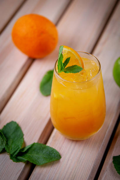 istock Alcoholic refreshing cocktail with orange, passion fruit and ice cubes, on the summer terrace of the restaurant 1433672597