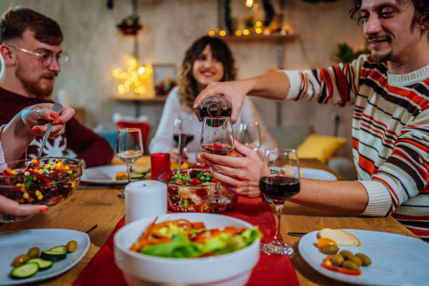 istock Pouring red wine into a glass 1433674077