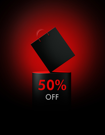 Black shopping bag sitting on 50 % Off written black podium. Front view. Horizontal composition with copy space. Great use for Black Friday related shopping concepts.