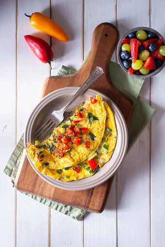 Homemade Vegetable Omelet with Tomato, Broccoli, Spinach, Onion and Red Bell Pepper