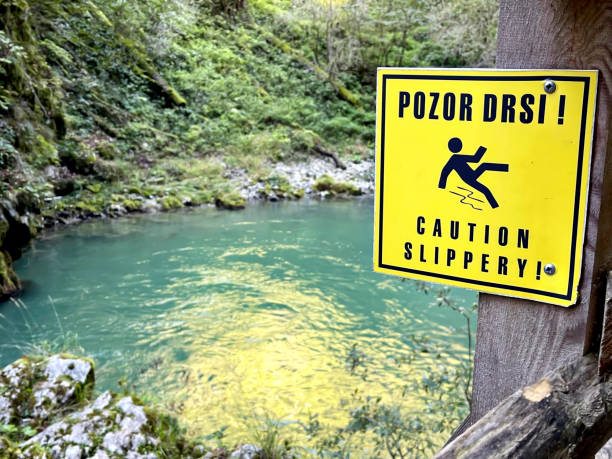 istock Sign warns visitors that walkway beside gorge can be slippery 1433677087