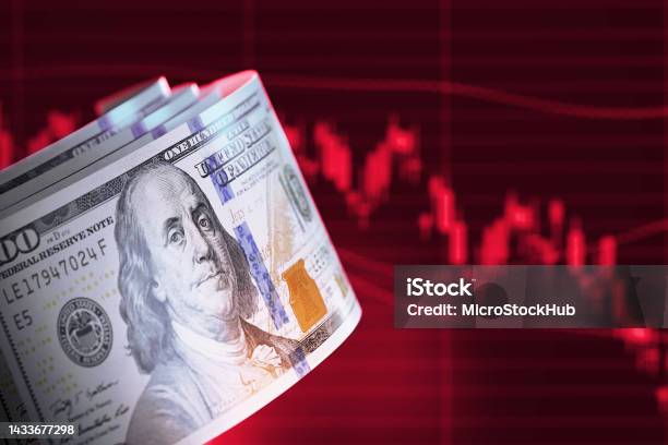 Finance Concept 100 American Dollar Bills Over Red Bar Graph Stock Photo - Download Image Now