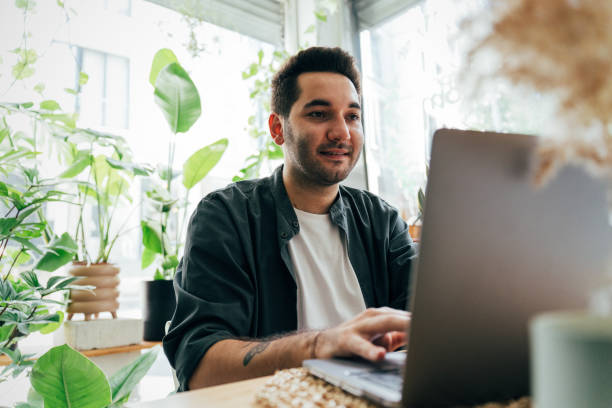istock Young Florist Works From the Shop 1433679373