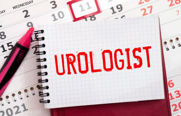 istock Urine sample and card with word UROLOGIST on table 1433693747