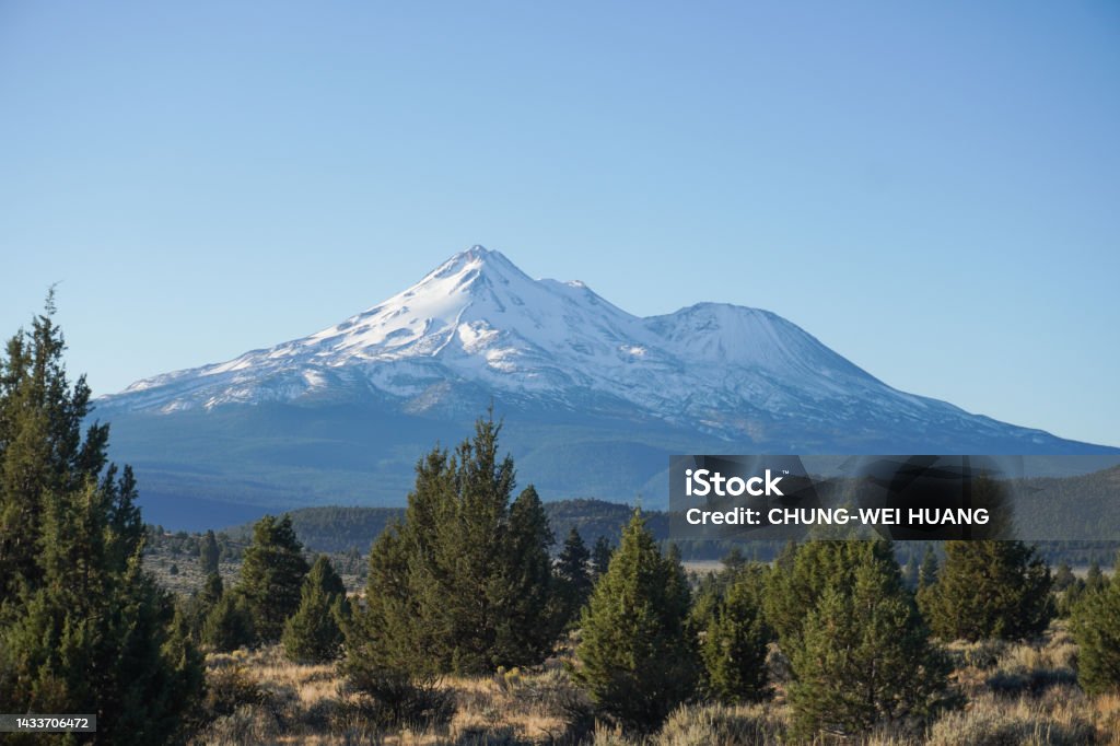 Snowy mountains in the distance Distant Stock Photo