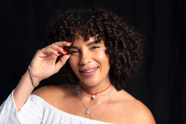 beautiful woman portrait against black background. - brezilya lar stok fotoğraflar ve resimler