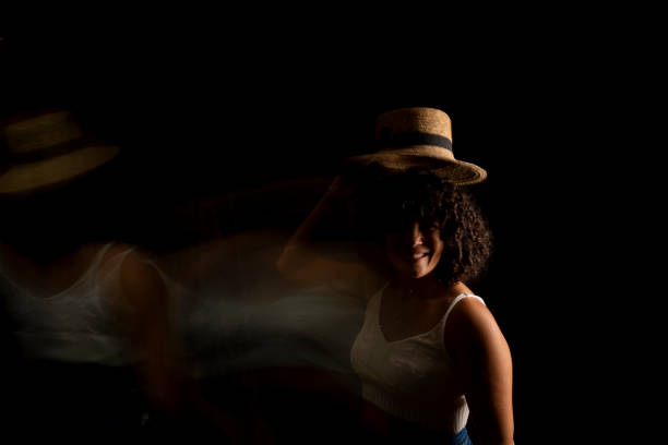 time-lapse view of woman moving a hat. - brezilya lar stok fotoğraflar ve resimler