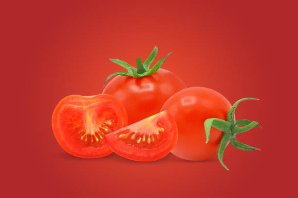 istock Whole tomato and slices isolated on red 1433708306