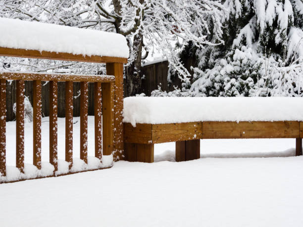 istock Snow covered wooden deck and backyard 1433709161