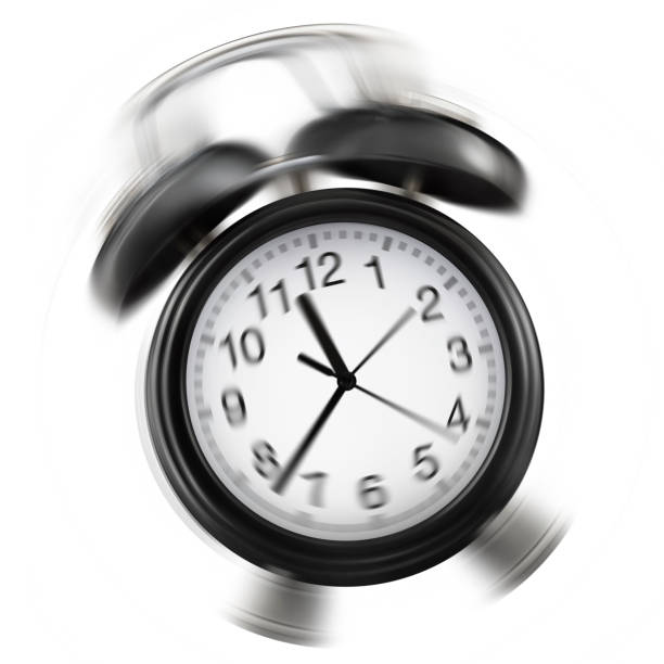 classic bell alarm clock ringing isolated on white background, black metal object front view still life