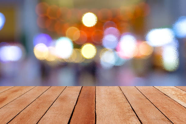 istock Wooden table with blur bokeh background 1433725041