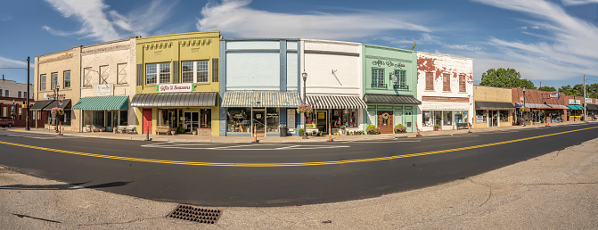 Inman, SC - August 7, 2022: Panoramic view of the lovely downtown area, with quaint shopping and dining. Perfect rural, country, small town street.