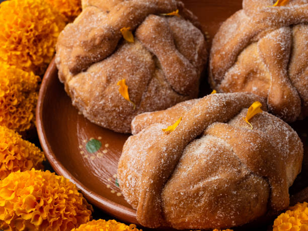 istock Dead bread and marigold flower, Mexican traditions and customs. 1433732773
