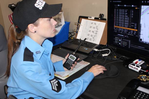 istock Female police officer, blue uniform 1433750407