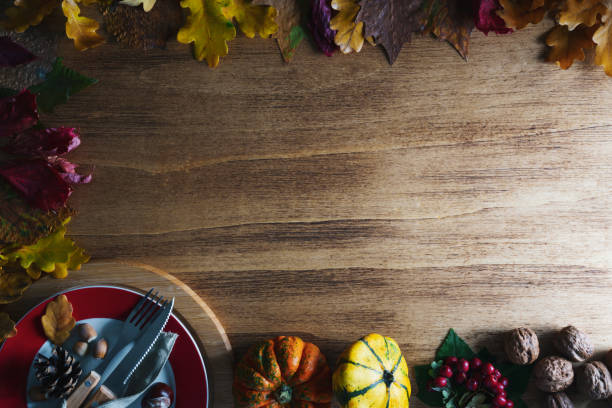 istock Thanksgiving pumpkins with fruits and falling leaves 1433761573