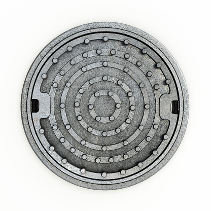 Closed sewer lid or manhole cover isolated on white.