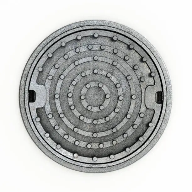 Photo of Closed sewer lid or manhole cover isolated on white