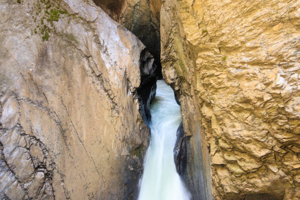 Trummelbach Falls are a series of ten glacier-fed waterfalls inside the mountain in Lauterbrunnen, Switzerland stock photo