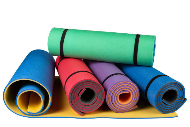istock Five carimats of different colors, half unwound and in a roll, on a white background, concept 1433782328
