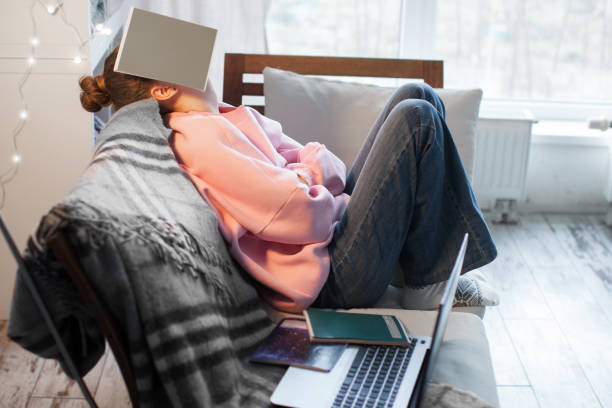 unhappy teen girl during home online education using laptop - learning boredom studying child imagens e fotografias de stock