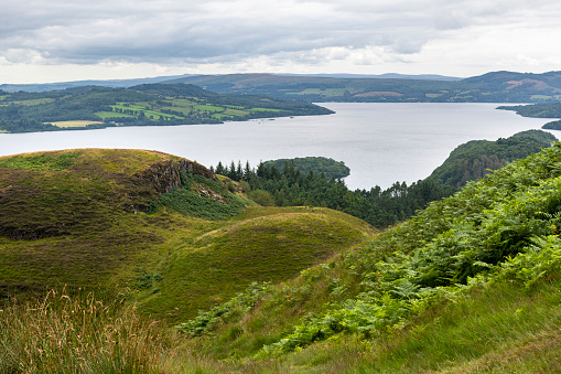 Part of a long distance walk, the West Highland Way passes this viewpoint of Loch Lomond from the summit of Conic Hill in Balmaha, Scotland, UK.