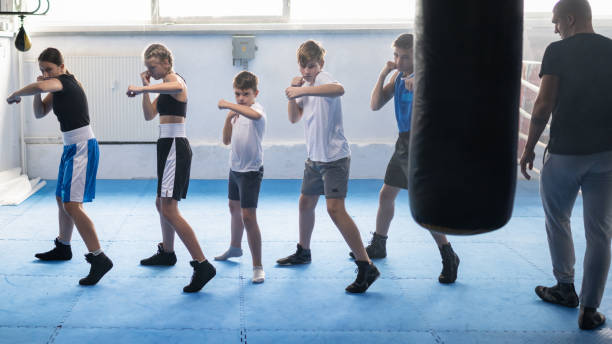 istock Group Of Kids Training Boxing 1433790457