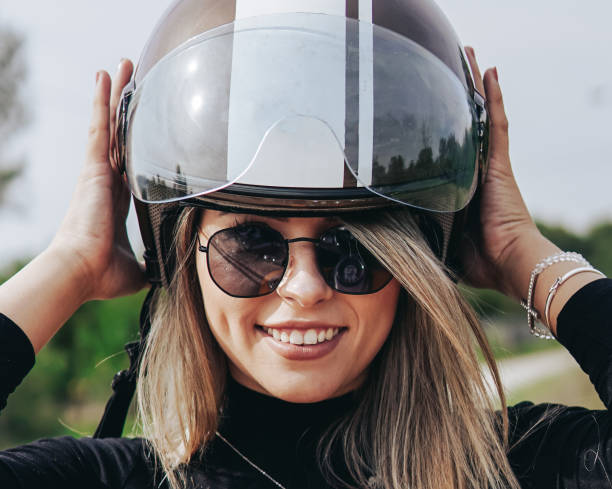 istock Woman getting ready for motorcycle ride 1433793759
