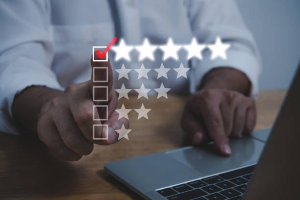 istock Customer Satisfaction Service. business people hand checking mark five star rating on checklist box to review good rating, digital marketing, good experience, customer feedback, satisfaction concept 1433794498