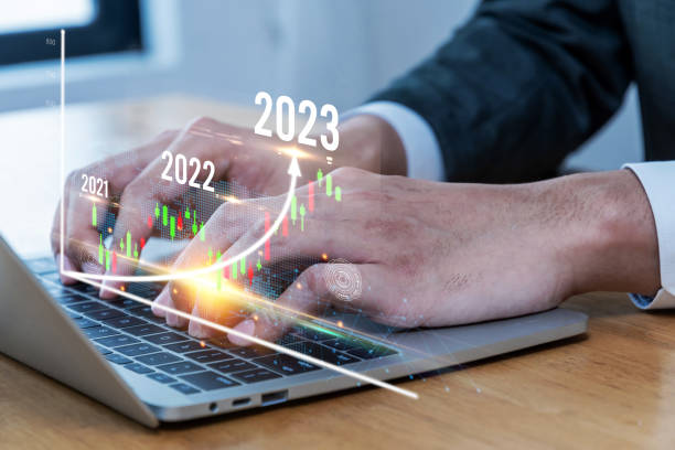 istock Business Strategy. business man hand using laptop computer working business financial with virtual graphic graph chart diagram, stock market, investment, digital technology, trading statistics concept 1433796491