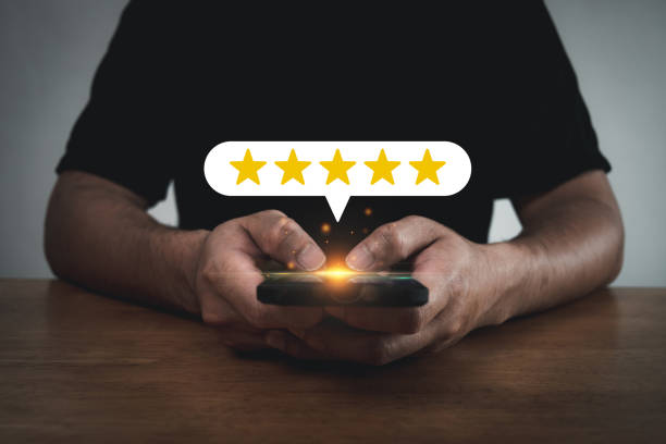 istock Feedback. people hand using mobile smart phone with five star button to review good rating, satisfaction, digital marketing, good experience, customer product rating review, customer feedback concept 1433796499