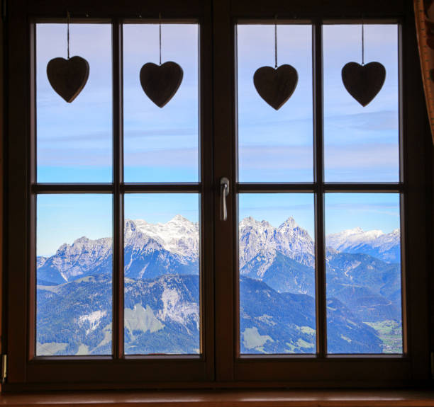 istock Austrian Alps Lofer Steinberger viewed from a wooden window 1433796893