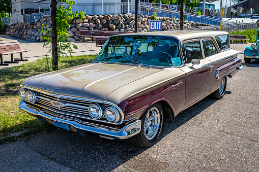 Falcon Heights, MN - June 19, 2022: High perspective front corner view of a 1960 Chevrolet Brookwood 2 Door Station Wagon at a local car show.