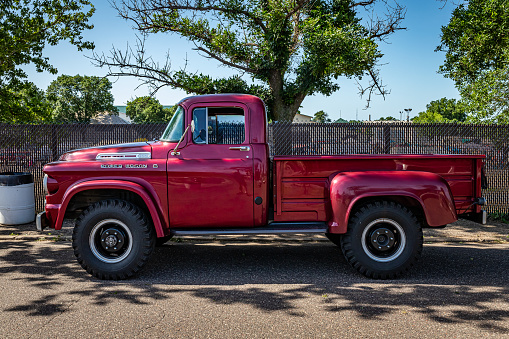 Falcon Heights, MN - June 19, 2022: High perspective side view of a 1958 Dodge W-100 Power Wagon Pickup Truck at a local car show.
