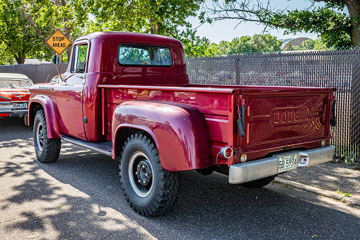 Falcon Heights, MN - June 19, 2022: High perspective rear corner view of a 1958 Dodge W-100 Power Wagon Pickup Truck at a local car show.