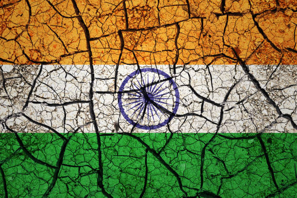 istock Dry soil pattern on the flag of India. 1433810432