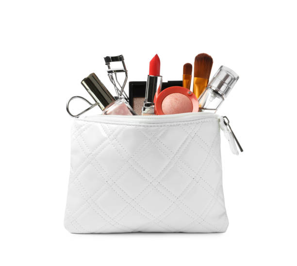 istock Stylish cosmetic bag with makeup products on white background 1433811867