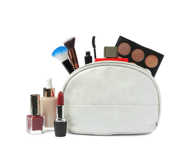 istock Stylish cosmetic bag and makeup products on white background 1433811868