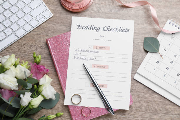 istock Flat lay composition with Wedding Checklist and planner on wooden table 1433812069