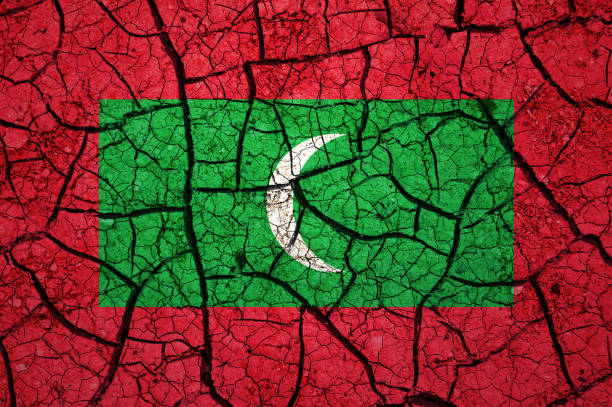 istock Dry soil pattern on the flag of Maldives. 1433815075