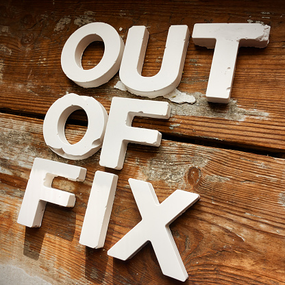 Out Of Fix - Text on old shabby wood planks
