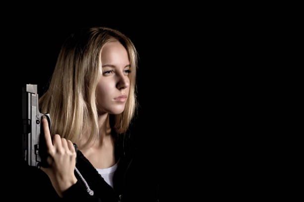 Portrait of a pretty young blonde woman with mascara running down her face after crying