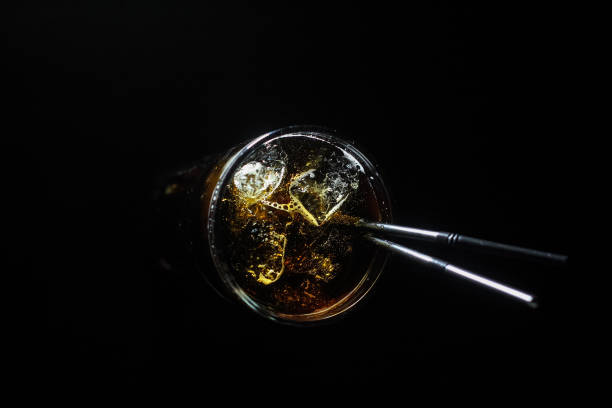 istock delicious creative bright cocktail booze alcohol with a straw is on the table in a club or a lighted bar 1433819607
