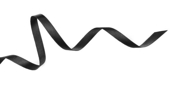 istock Elegant black ribbon isolated on white, top view 1433820519