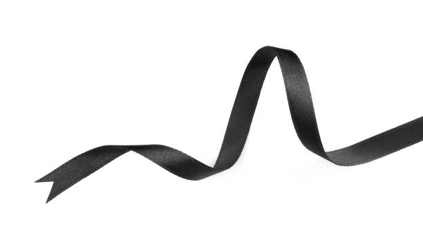 istock Elegant black ribbon isolated on white, top view 1433820985