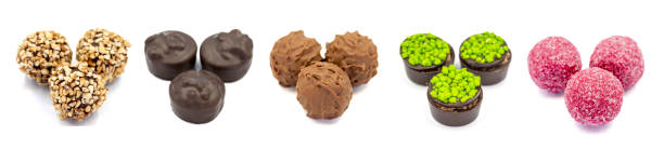 istock Chocolate praline. Assorted chocolates isolated on a white background. close up 1433826282