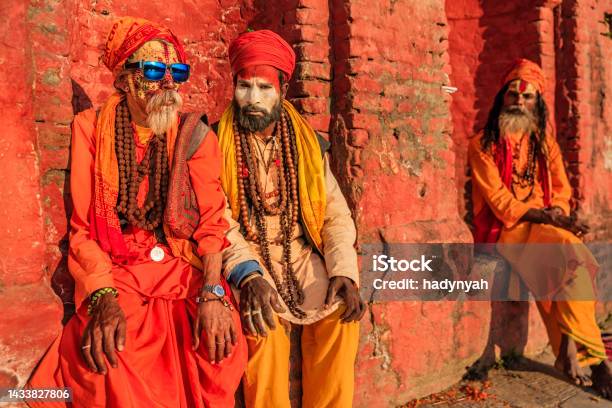 Sadhu Indian Holymen Sitting In The Temple Stock Photo - Download Image Now - Spirituality, Men, Yoga