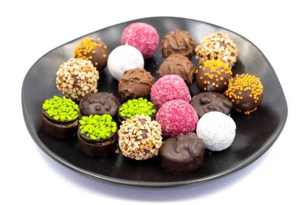 istock Chocolate praline. Assortment of chocolates on a white background. Close up 1433827889