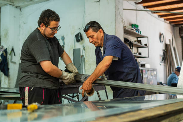 istock Employees of a locksmith are working on cutting material 1433828482