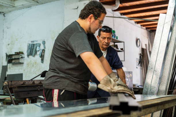 istock Employees of a locksmith are working on cutting material 1433828501